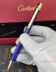 Wholesale AAA Replica Cartier Santos de Ballpoint Pen Blue Resin and Gold Clip (3)_th.jpg